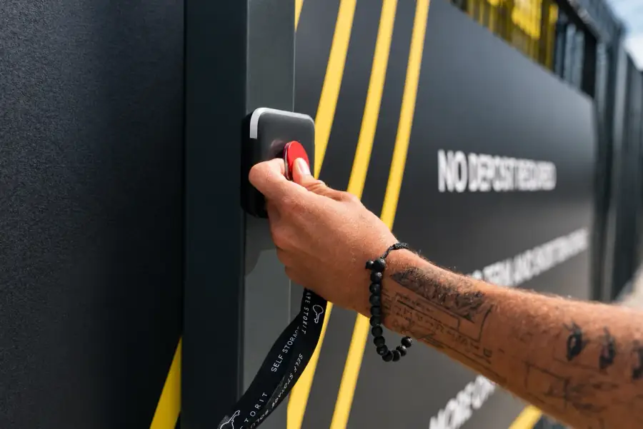 A hand at the access keypad of a Cape Storit facility